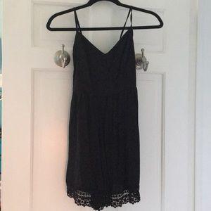 black romper with lace hem